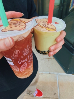 Two plastic cups of boba tea