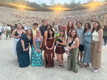 Group photo of Bethie and other ITDP Summer 2024 Intensive participants at the Epidaurus theatre in Tolos, Greece