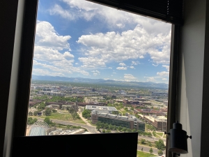 View of Rocky Mountains through apartment window