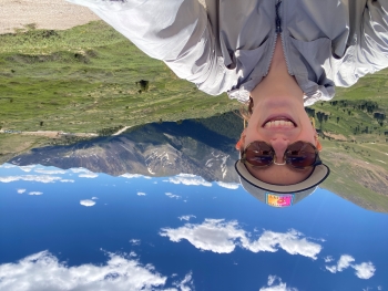 Cameron taking a selfie while on a hike at Loveland Pass