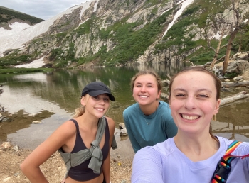 Selfie of Josalin, Ella, and Cameron on a nature hike at St. Mary's Glacier