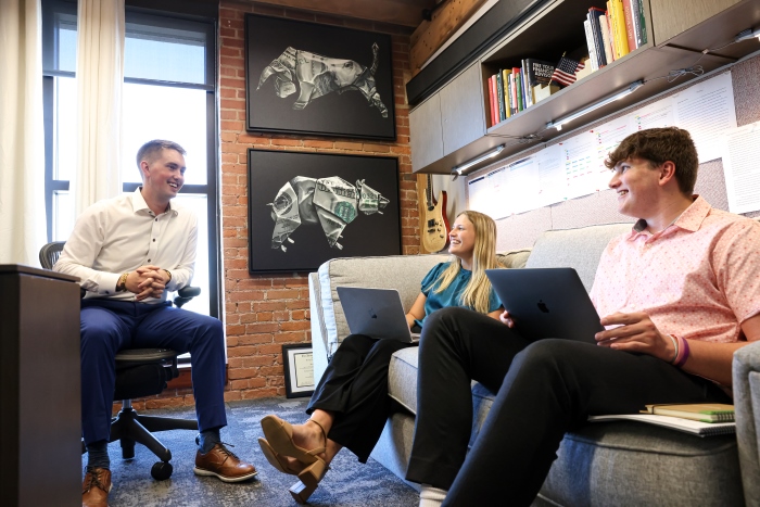 Krystin and another Cornell intern work with their coach at Northwestern Mutual.