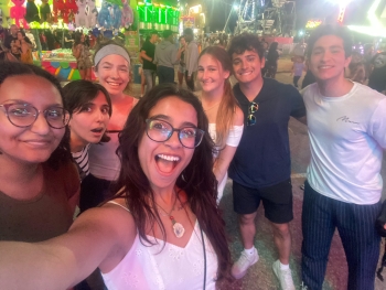 Laura, Moodi, and the other interns in a group selfie at the Olmstead County Fair