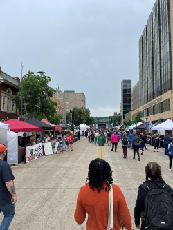 Small crowd of people in the street