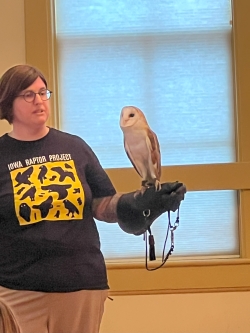 Raptor Center expert with a barn owl