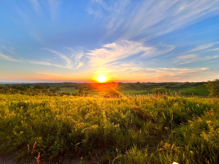 Beautiful sunrise over a wide expanse of Iowa prairie