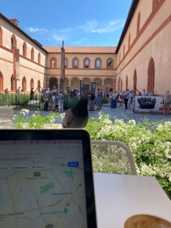 View over someone's phone of a 15th-century castle courtyard area