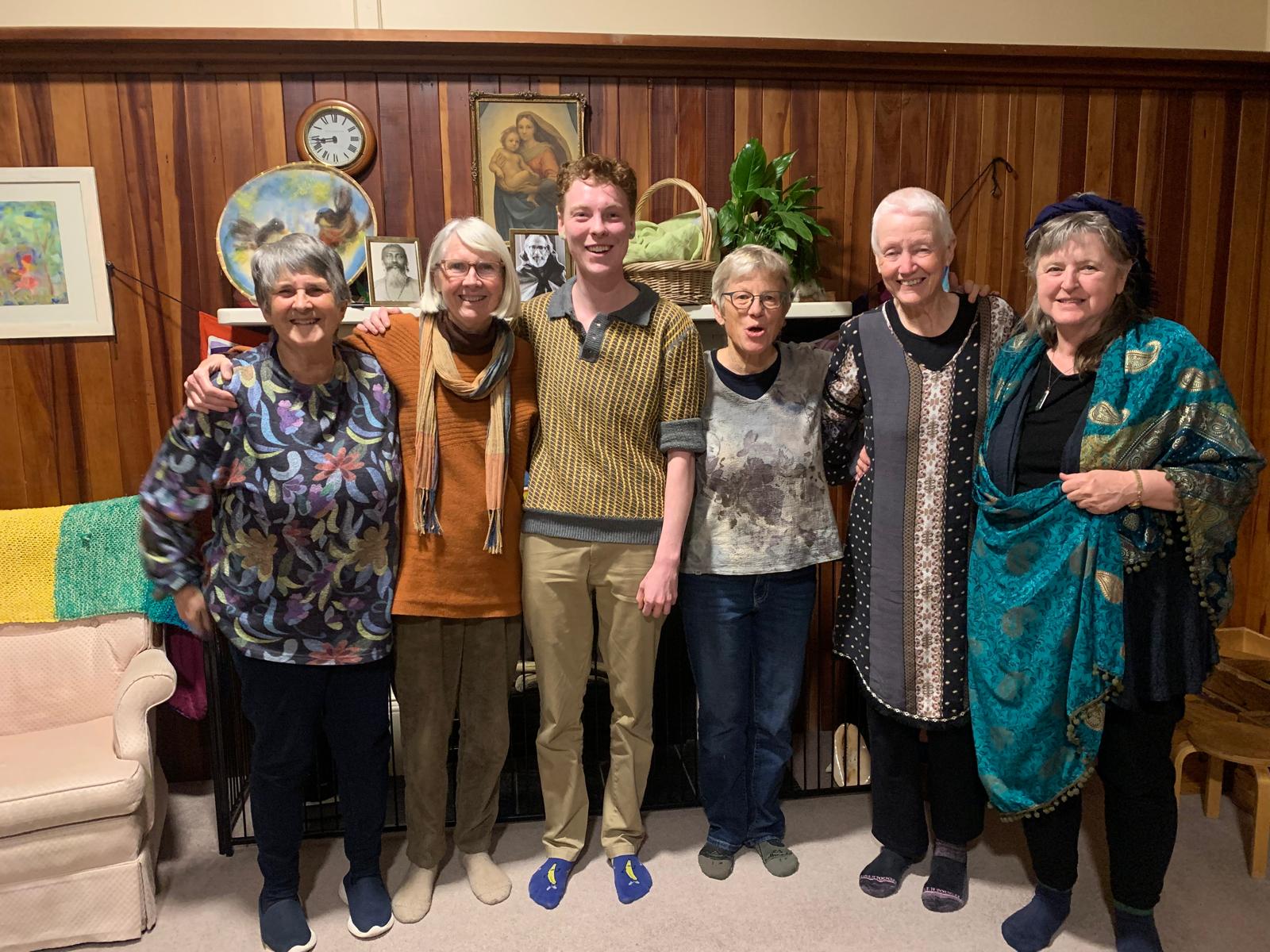 Lorne with a group of church goers in a church