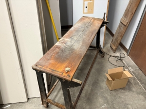 Old wooden ironing board slightly cleaner