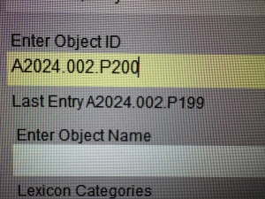 Screenshot of computer record with photo numbers recorded