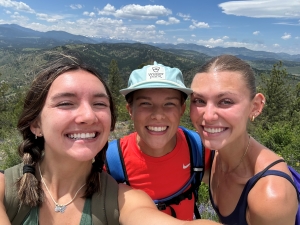 Selfie of Alyza Koppes, Sophie Stumbo, and Ava Claussen-Tubbs while hiking