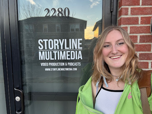 Chrysalis in front of the front door of storyline multimedia