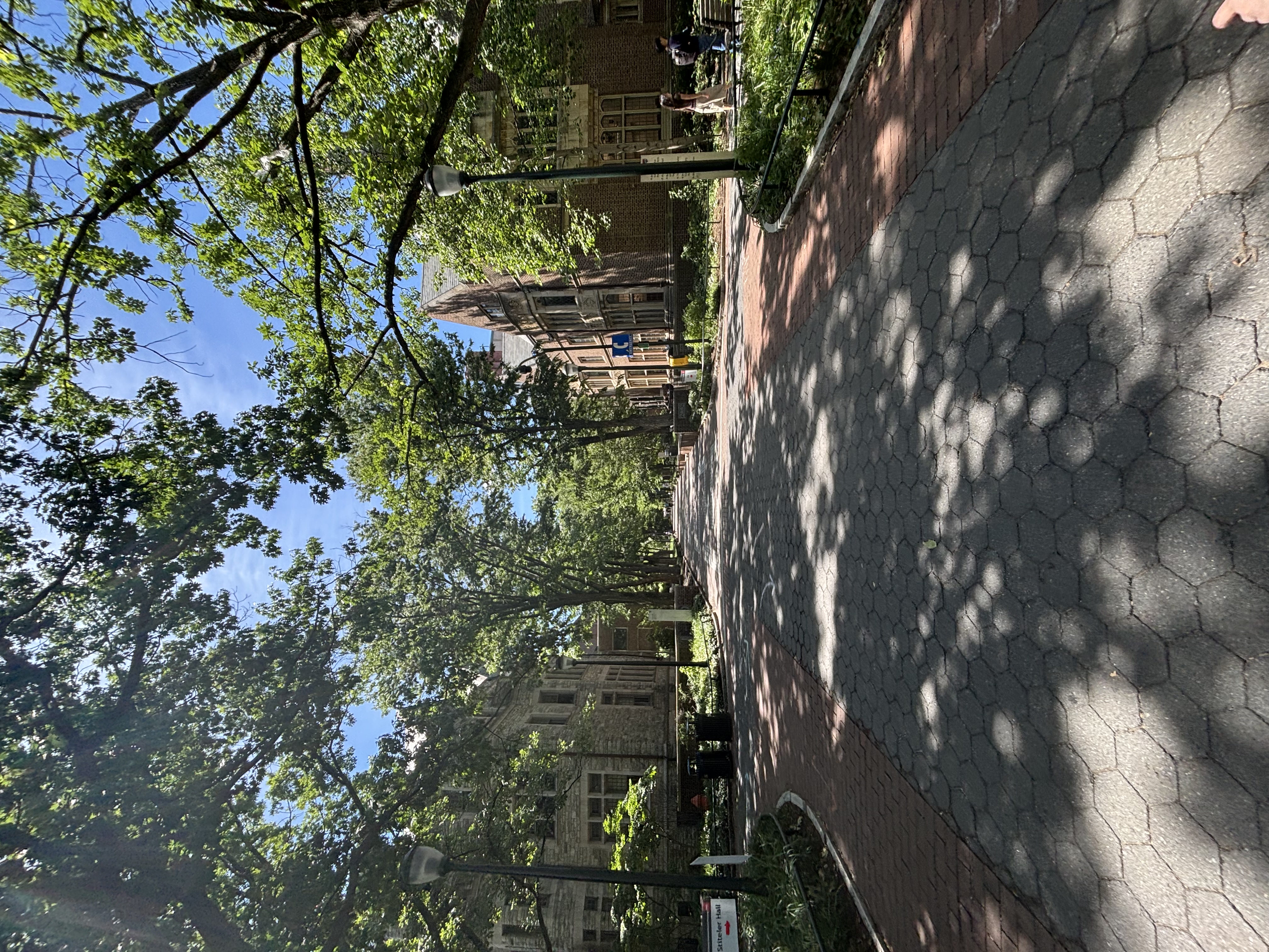 Student walking across the campus at University of Pennsylvania.
