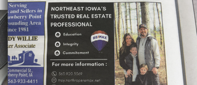 Image shows an advertisement in the newspaper for the real estate agent that Ricky is interning with.