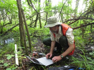 Dan checking his well monitoring data