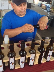 The vendor was mixing the best balsamic vinegar and olive oil