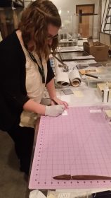 Writing accession numbers on object tags.