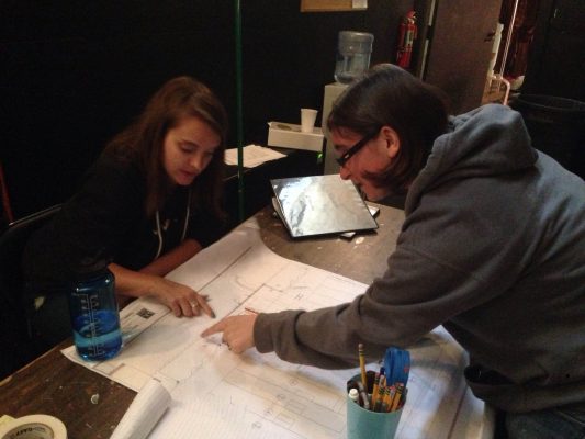 Devon and Rachel looking at a ground plan