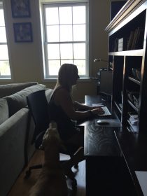 Working hard from home with my coworker Champ!