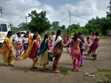 Children playing game of Around the Mountain