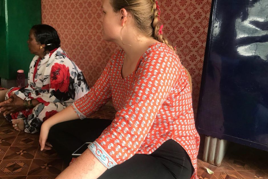 Taylor with Village Health Care Worker