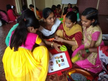 Girls in circe playing with food based game